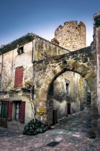Corner tower of the castle Villerouge Termenès and stone arch. Built in the 12th century. Monument historique. Corner tower of the castle Villerouge Termenès and stone arch. Built in the 12th century. Monument historique.